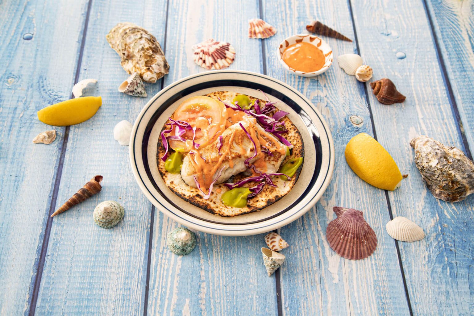 Fish fillet tacos with gochujang yogurt garlic dipping sauce O'Food